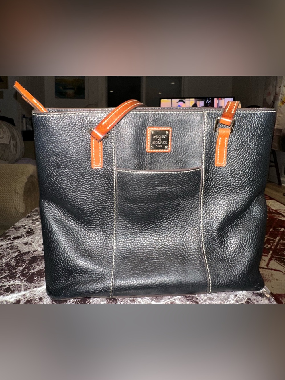 Dooney & Bourke Black Pebbled Leather Tote with Red Lining and Brown Trim